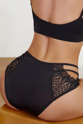 Culotte noire à petits nœuds et découpes en dentelle